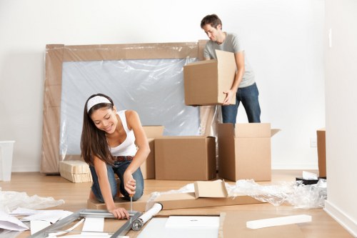 Moving boxes and furniture prepared for a Brompton home removal