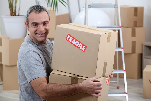 Removals team handling items safely during a Brompton move