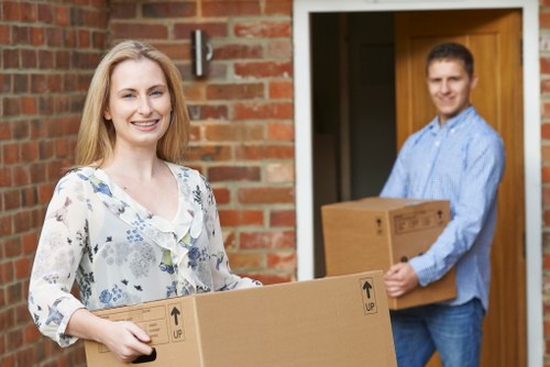 Professional movers handling belongings carefully in Brompton