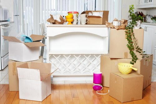 Careful wrapping of fragile items for house removals in Brompton