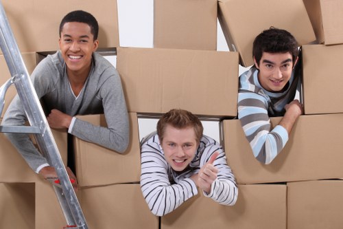 Packed furniture and boxes ready for a Brompton home move