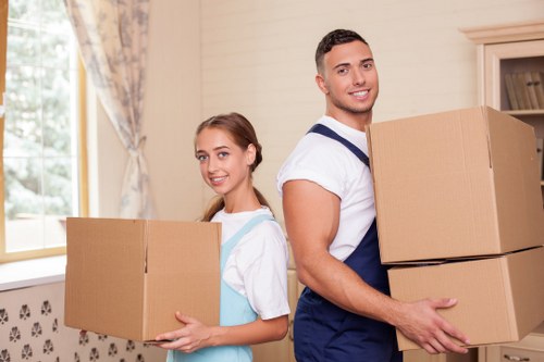 Packed moving boxes and furniture ready for same day removals in Brompton