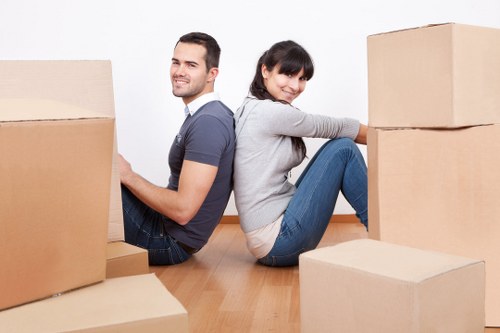 Student packing belongings for Brompton relocation