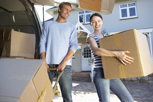 Professional movers handling a Brompton relocation with care