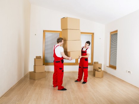 Prepared moving day essentials and labeled boxes for a Brompton house move