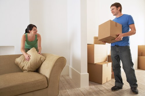 Furniture removals team protecting items during transport in Brompton
